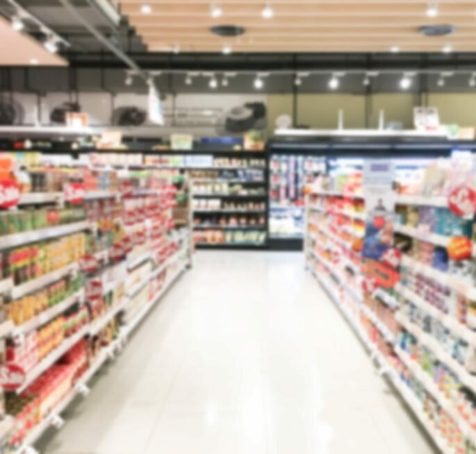 Abstract blur supermarket retail and shopping mall interior for background